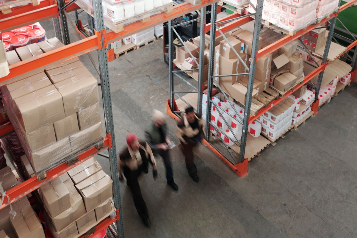Team reviewing warehouse floor